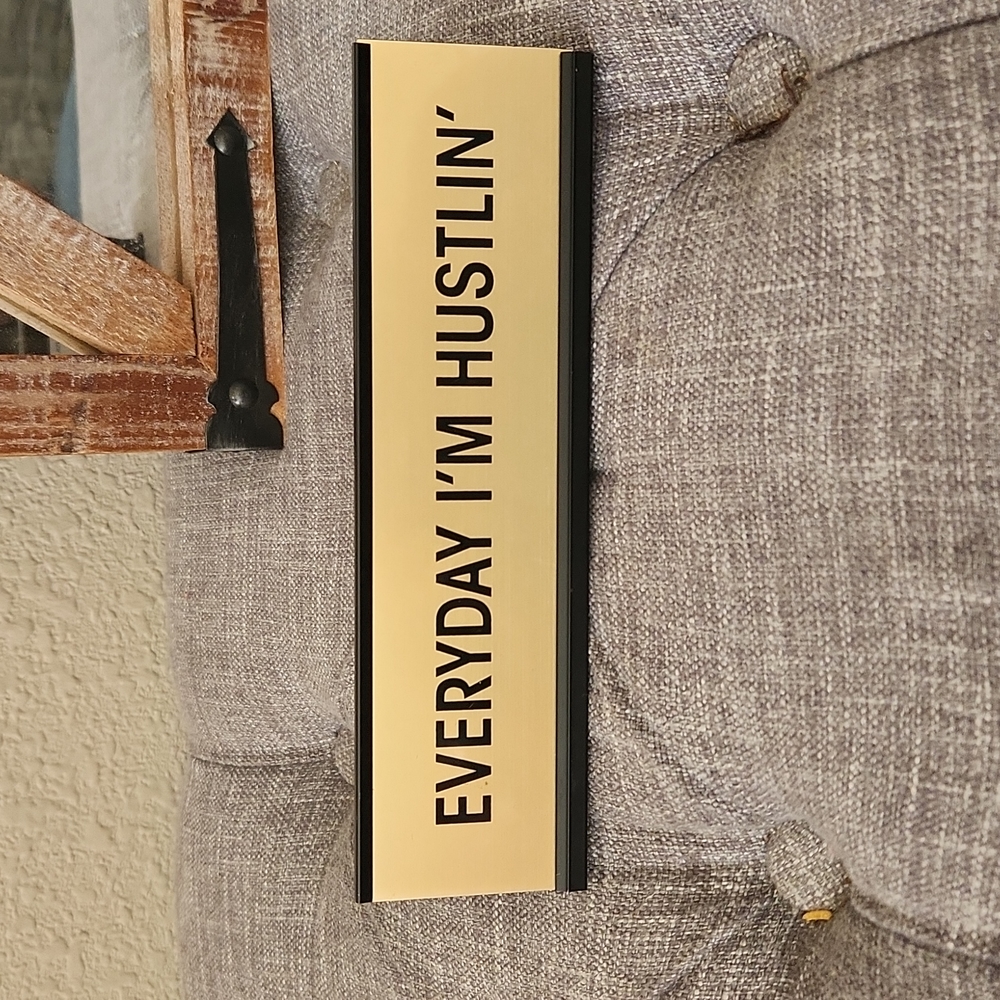 Everyday I'm hustling sign